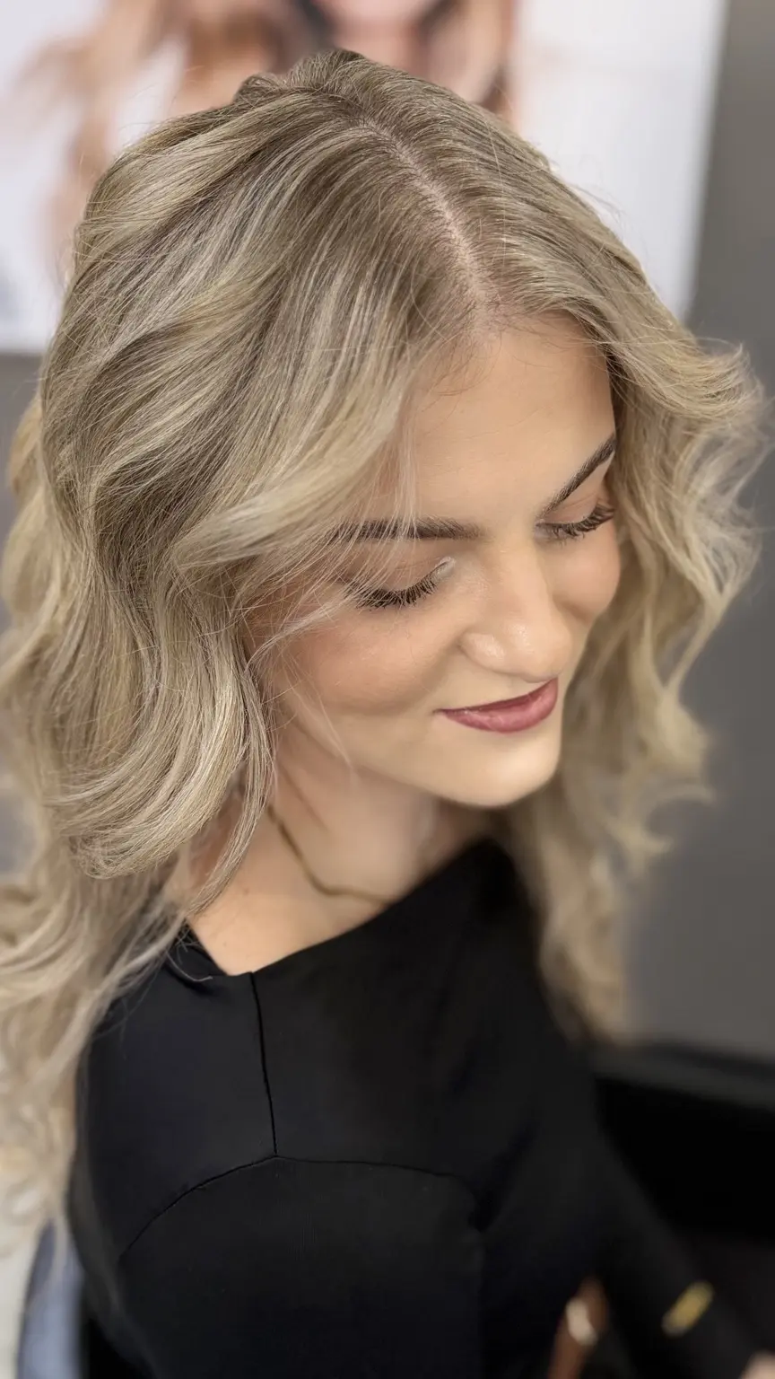 Soft blonde face framing colour and waves