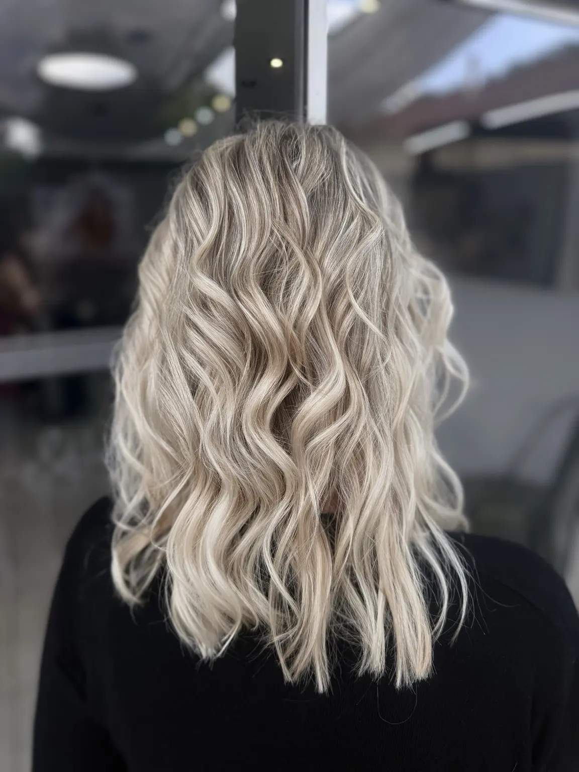 Cool blonde shoulder-length waves
