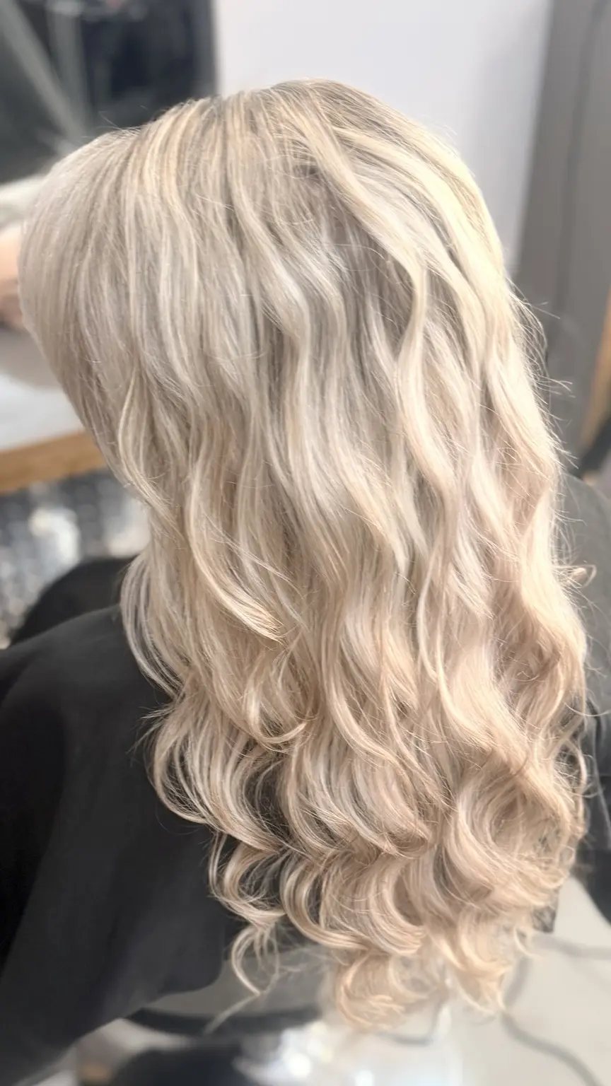 Pearl blonde hair with soft curls